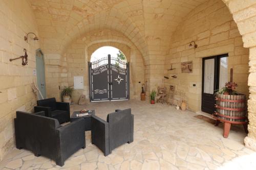 Posezení v ubytování masseria Carlini