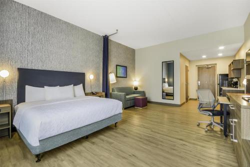 Ένα ή περισσότερα κρεβάτια σε δωμάτιο στο Home2 Suites By Hilton Cincinnati Midtown Oakley