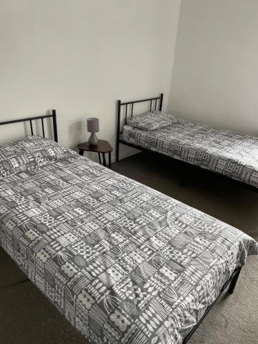 Postel nebo postele na pokoji v ubytování Tamworth Home