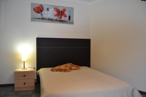 Cama o camas de una habitación en Rib Brava Garden Apartment