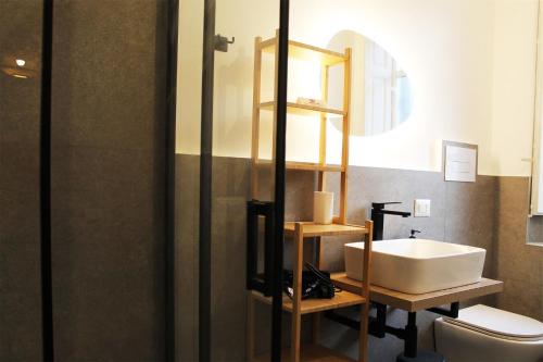 Ένα μπάνιο στο Radici Rooms