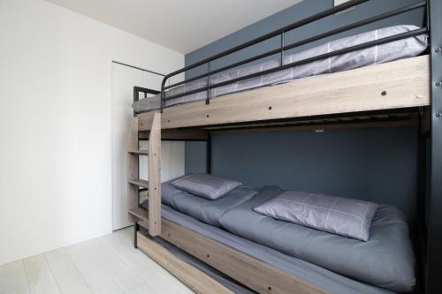 Postel nebo postele na pokoji v ubytování Tenjin Higashi Russo 201 - Vacation STAY 16882