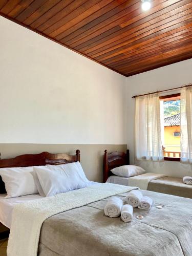 Katil atau katil-katil dalam bilik di Pousada Verona Paraty