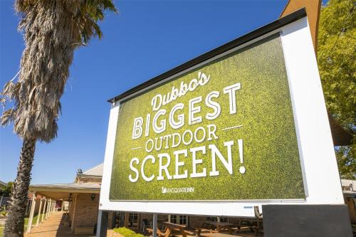 a billboard sign for a outdoor outdoor screen at Nightcap at Macquarie Inn in Dubbo