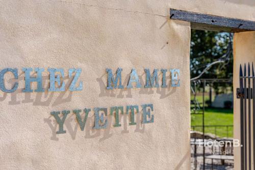 a piece of cardboard with graffiti on it at Cottage Mamie Yvette Private Spa in Blanc