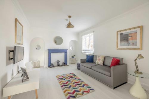 a living room with a couch and a table at Host & Stay - Meadow Way in Windsor