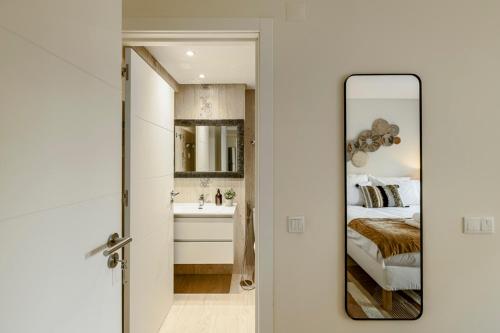 Postel nebo postele na pokoji v ubytování Cortes Reais Guesthouse By All2gether