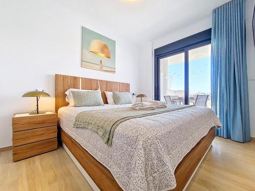 Giường trong phòng chung tại Santa Rosalia Sunset Apartment - 7110
