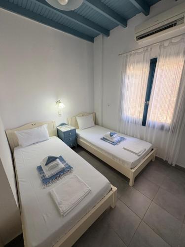 Posteľ alebo postele v izbe v ubytovaní Sofia Rooms