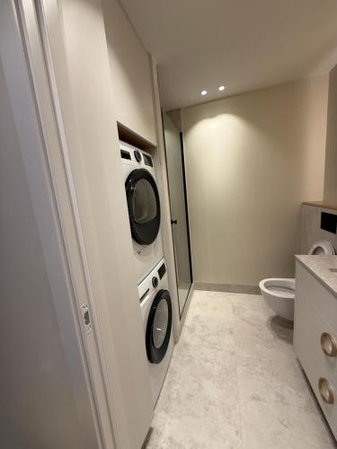 Ένα μπάνιο στο Poilsio Apartamentai