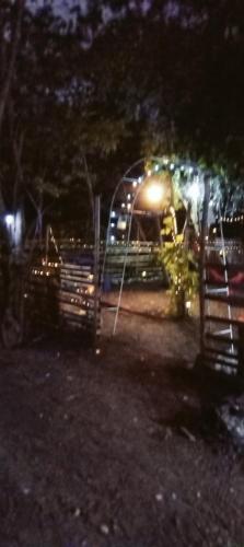 a park at night with a roller coaster at PINOY YOGA POLE PIYOPO LA UNION fan kubo 4 pax in Rimus