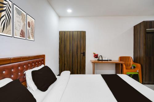 Ένα ή περισσότερα κρεβάτια σε δωμάτιο στο Hotel O HNG INN