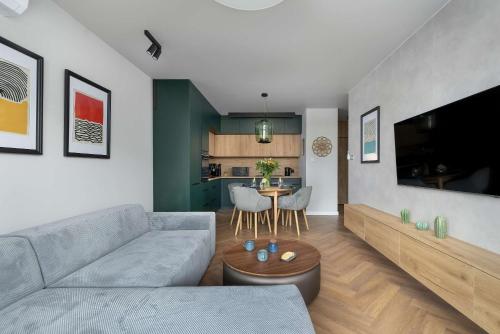 Bright Apartment Dziwnów with Parking, Air Conditioning & SPA by Noclegi Renters