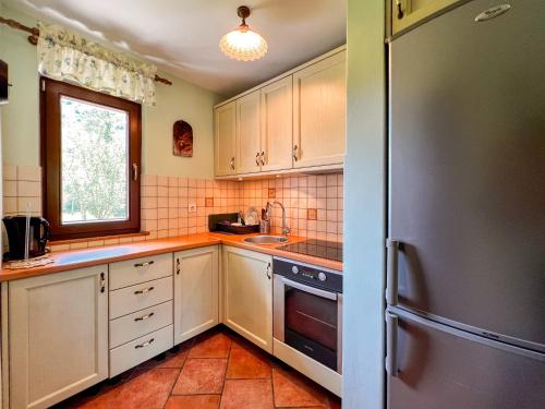 Kuchyň nebo kuchyňský kout v ubytování Casa Kolpa