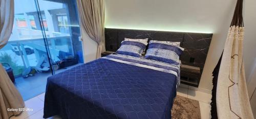 Ένα ή περισσότερα κρεβάτια σε δωμάτιο στο Apartamento Completo Barra Grande S8