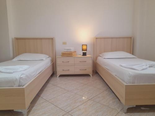 Giường trong phòng chung tại Port View Condo