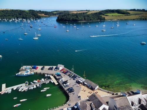 an aerial view of a marina with boats in the water at Pennant in Saint Mawes
