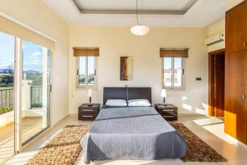 En eller flere senge i et værelse på Villa Green Valley 3