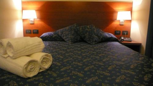 Una cama o camas en una habitación de Hotel Felice
