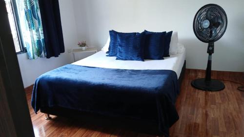 Una cama o camas en una habitación de Casa Fabiana