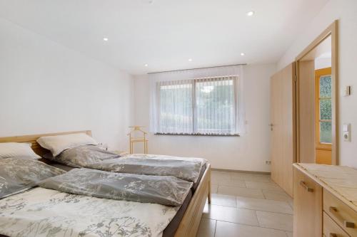 Postel nebo postele na pokoji v ubytování Ferienwohnung Kiesel
