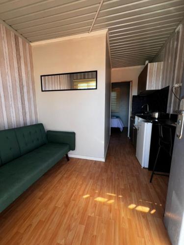 Kuchyň nebo kuchyňský kout v ubytování Oasis Mini Deptos