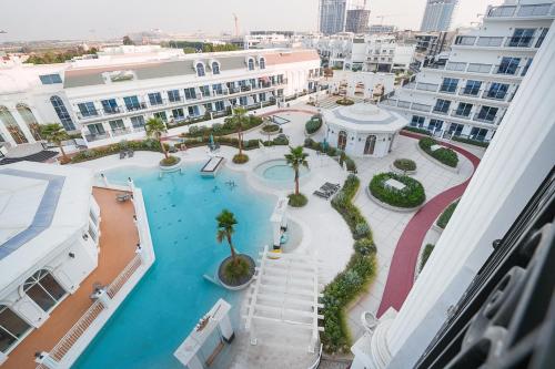 an overhead view of a pool in a building at EasyGo- Luxury Living with Resort Facilities and Amenities in Dubai