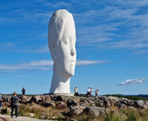 a statue of a head on top of a hill at Large House with Two Apartments in Central Skarhamn in Skärhamn