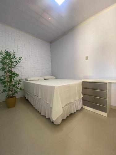 Ένα ή περισσότερα κρεβάτια σε δωμάτιο στο Pousada O auto da Compadecida