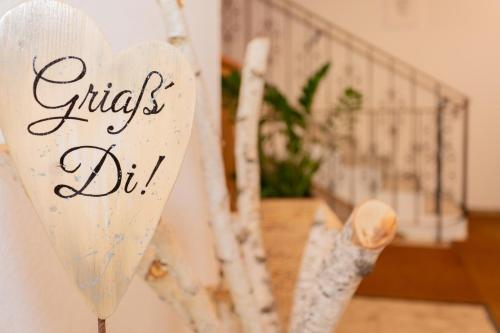 a white heart balloon with the words girls diy at Rainberghof***, Appartements in Rauris