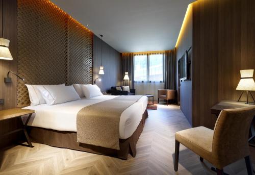 A bed or beds in a room at Áurea Washington Irving by Eurostars Hotel Company