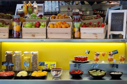 a produce section of a store with fruits and vegetables at B Hotel in Barcelona