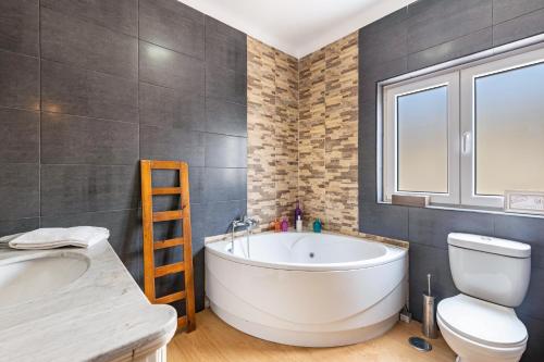 Ένα μπάνιο στο Zen Village Rosa