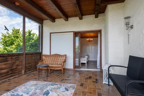 Χώρος καθιστικού στο Wohnung im Ferienhaus Griesstätt