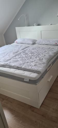 Postel nebo postele na pokoji v ubytování Hygge Nest