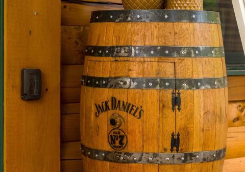 a wooden barrel with just dances written on it at Chic Designer Log Cabin Hot Tub Pool Tabledecks in McGaheysville