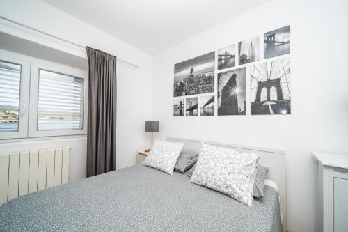 Postel nebo postele na pokoji v ubytování Apartments Barbaresko