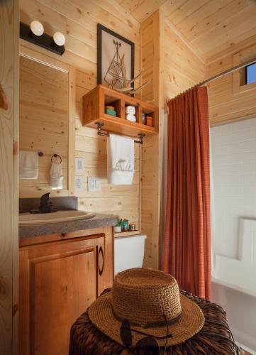 a hat sitting on a table in a cabin at Capitol Reef Resort in Torrey