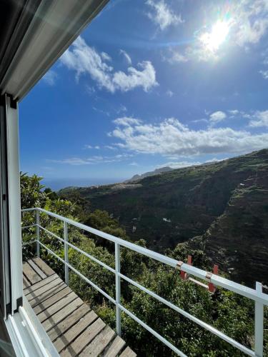 a view from the balcony of a house at Charming hill view retreat in Funchal