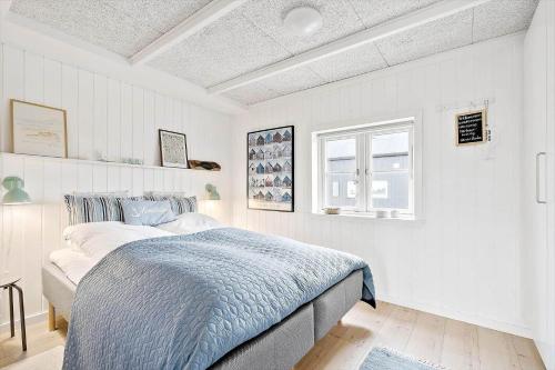 Postel nebo postele na pokoji v ubytování 8806-Hvide-Sande-Ae-Gammel-Havn-15