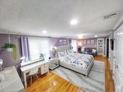 a bedroom with a bed and a desk in it at 597b) Large 4 bedroom - Pool - Fire Pit in Wolcott