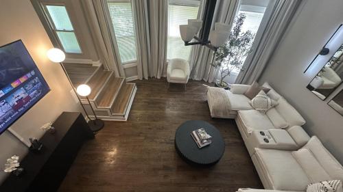 an overhead view of a living room with a tv at Sleeps 18 6BR Gym, Game Room and Theater in Chicago