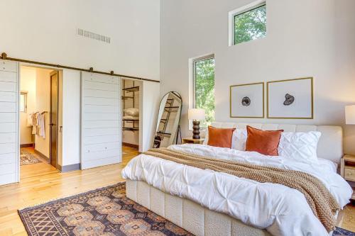 a bedroom with two beds and a walk in closet at Modern Oasis-lots Of Amenities Including A Pool! 