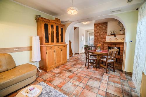 a living room with a couch and a table at B&B Apartment Racman in Brežice