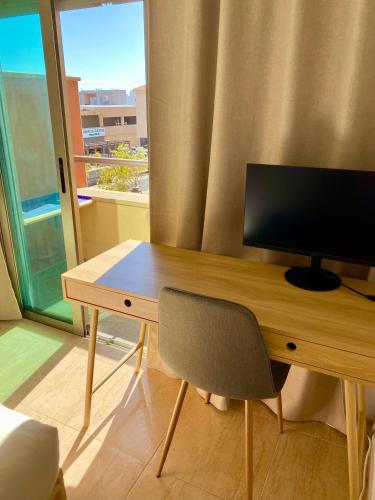 Apartment with Rooftop Pool - TideView Corralejo