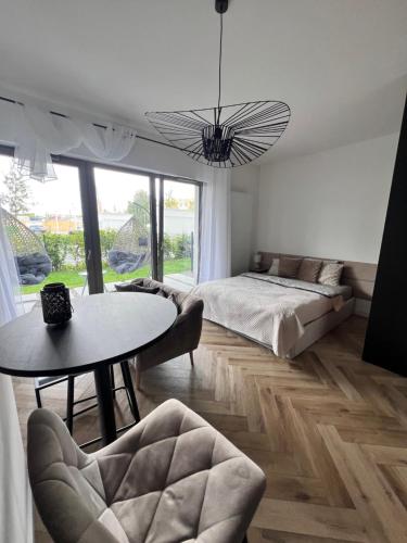 Ένα ή περισσότερα κρεβάτια σε δωμάτιο στο NOHO Loft