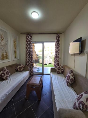 Postel nebo postele na pokoji v ubytování Elabd Family Porto Chalet