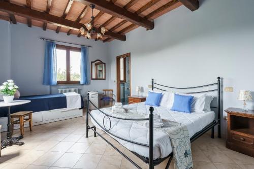 Postel nebo postele na pokoji v ubytování Masseria Le Querciole