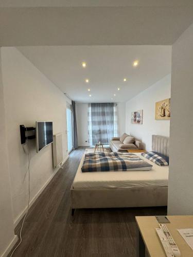 Ένα ή περισσότερα κρεβάτια σε δωμάτιο στο Modern Apartment Good Location
