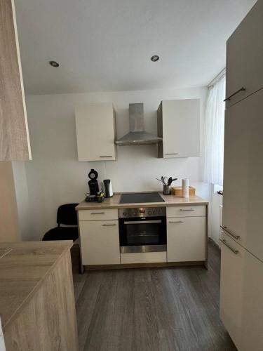 Η κουζίνα ή μικρή κουζίνα στο Modern Apartment Good Location